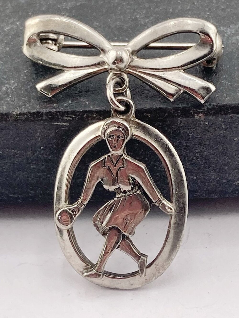 VINTAGE Silver tone metal lady bowler dangle bow brooch c. 1950s bowling pin